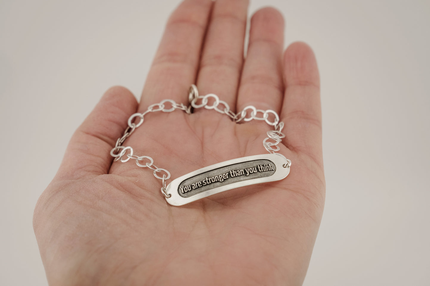 Bracelet, Embossed "You Are Stronger Than You Think" Sterling Word Bracelet