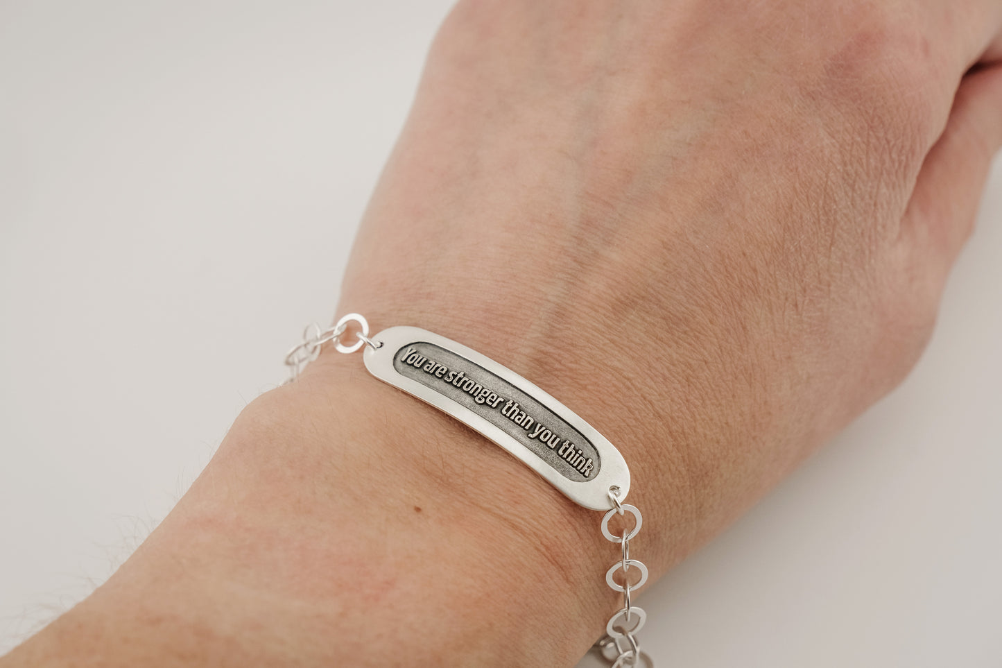 Bracelet, Embossed "You Are Stronger Than You Think" Sterling Word Bracelet