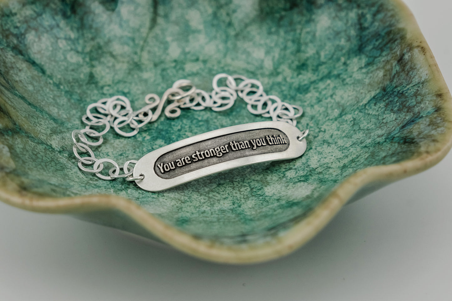 Bracelet, Embossed "You Are Stronger Than You Think" Sterling Word Bracelet