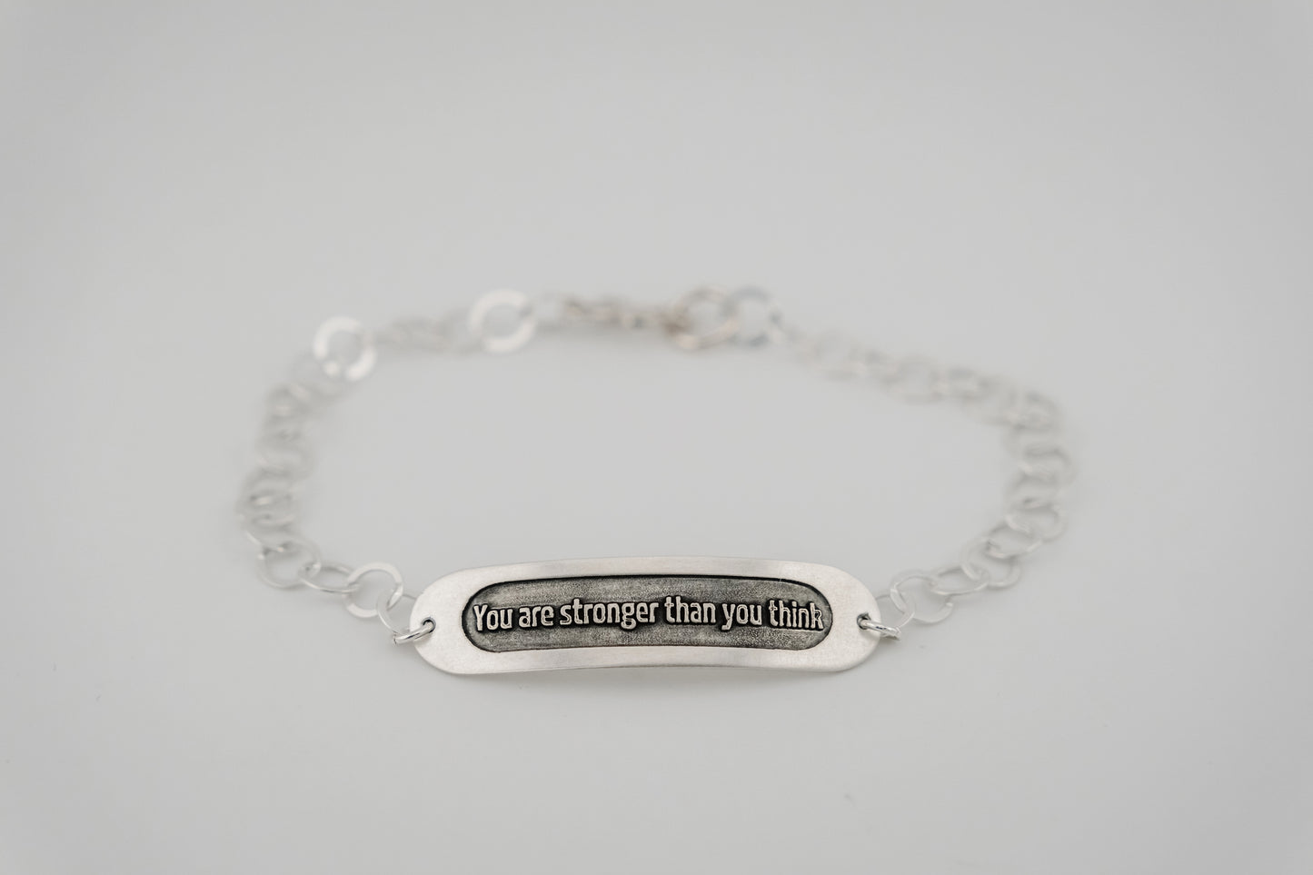 Bracelet, Embossed "You Are Stronger Than You Think" Sterling Word Bracelet