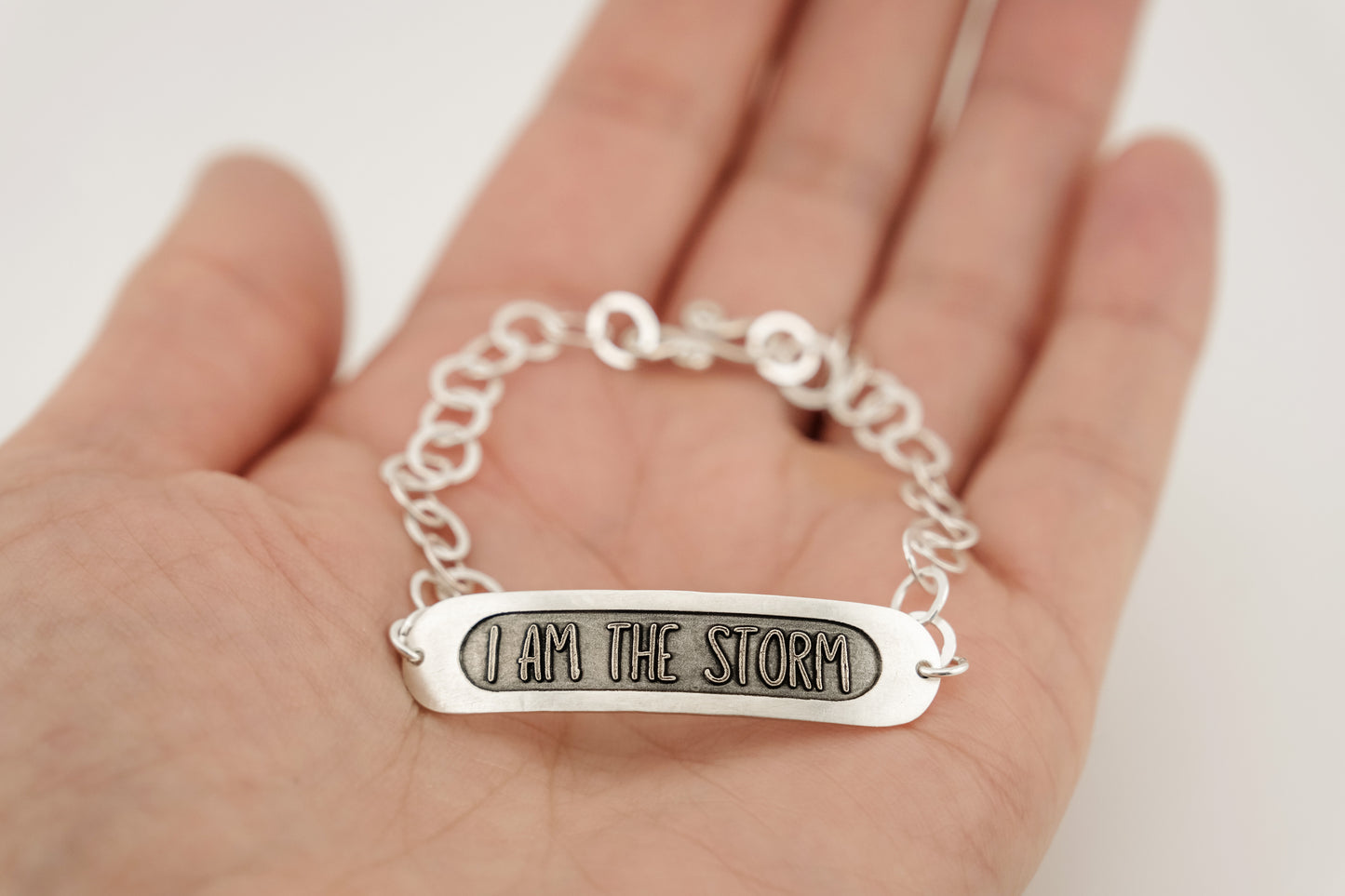 Bracelet, Embossed "I Am The Storm" Sterling Word Bracelet
