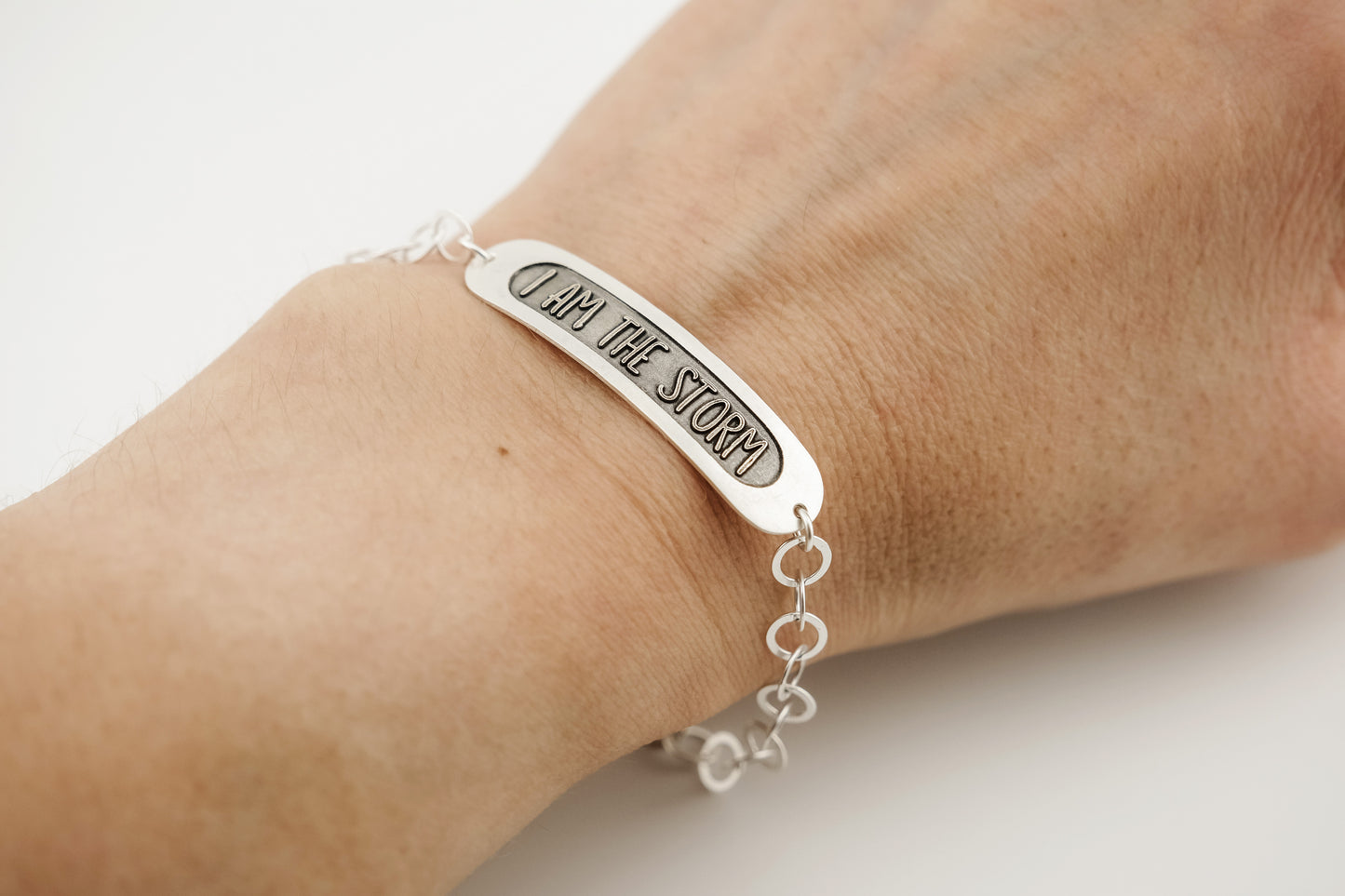 Bracelet, Embossed "I Am The Storm" Sterling Word Bracelet