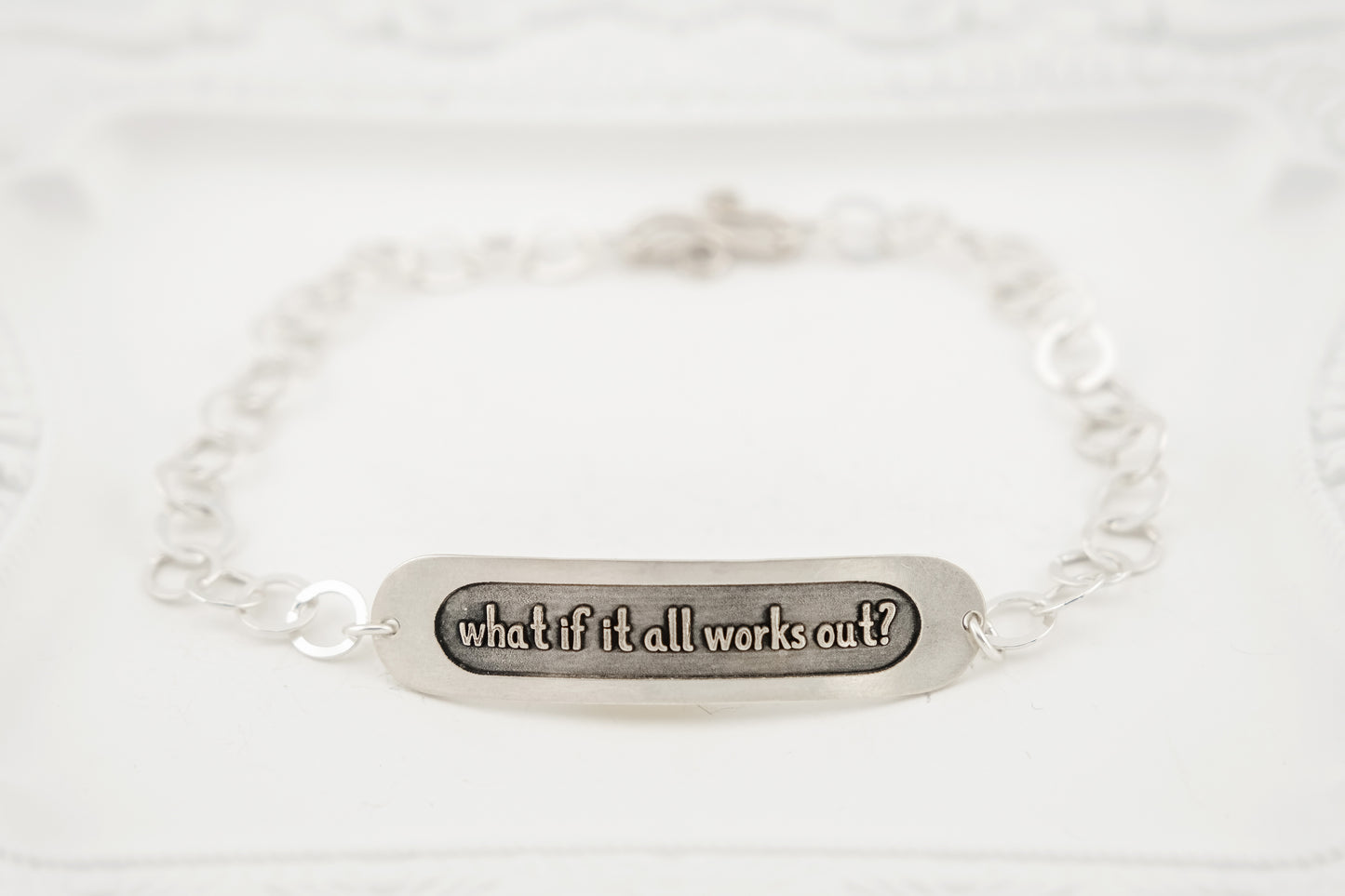 Bracelet, Embossed "What if it all works out?" Sterling Word Bracelet