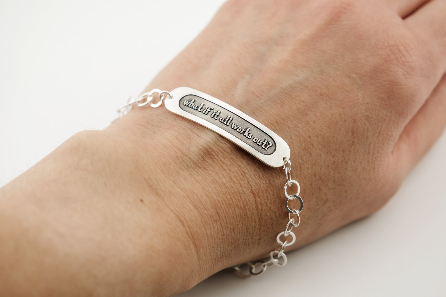 Bracelet, Embossed "What if it all works out?" Sterling Word Bracelet