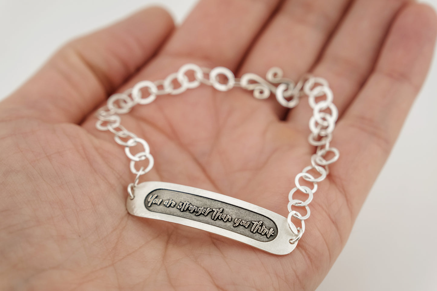 Bracelet, Embossed "You Are Stronger Than You Think" Sterling Word Bracelet