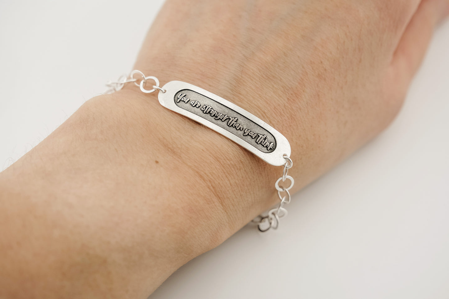 Bracelet, Embossed "You Are Stronger Than You Think" Sterling Word Bracelet